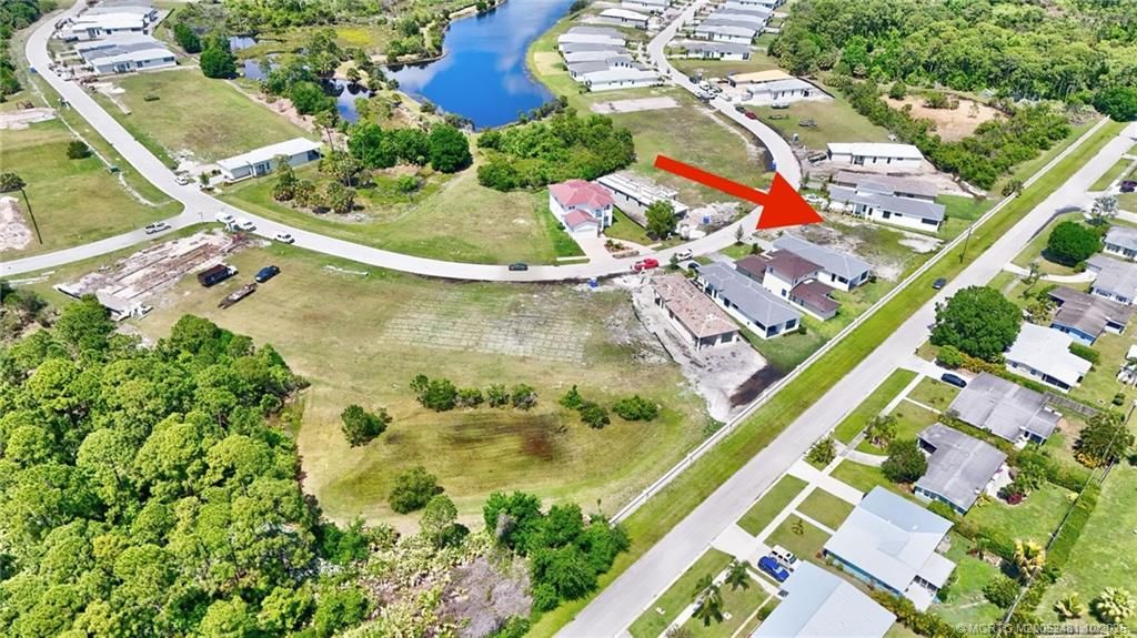 Photo of 300 SE Via Sangro, Port Saint Lucie, FL 34952 (MLS # M20052481)