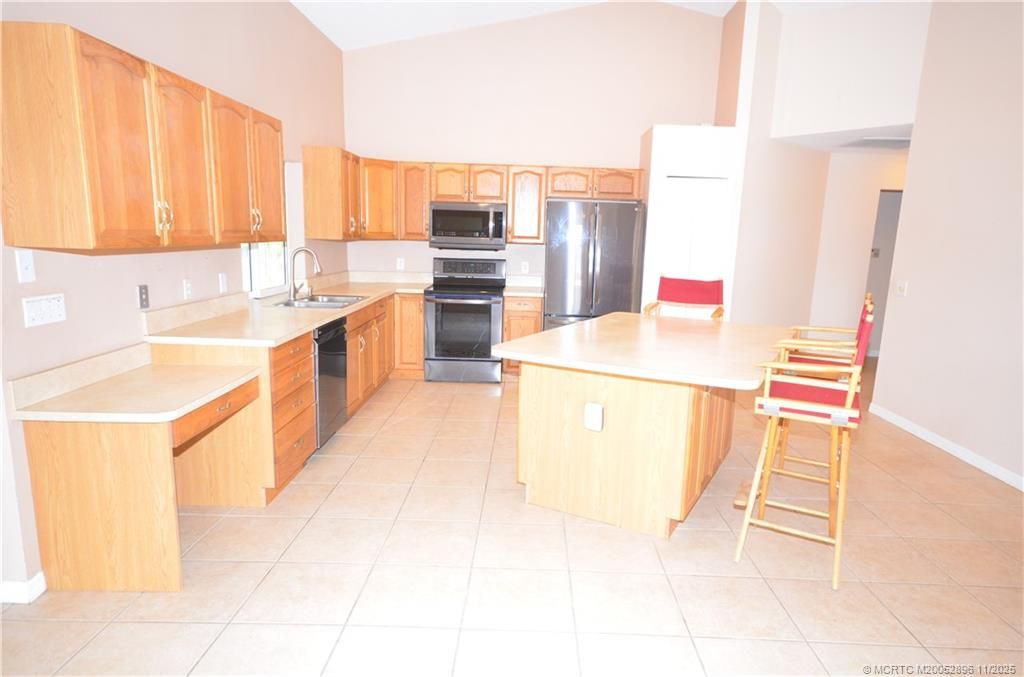 Photo of 321 SE Cork Road, Port Saint Lucie, FL 34984 (MLS # M20052896)