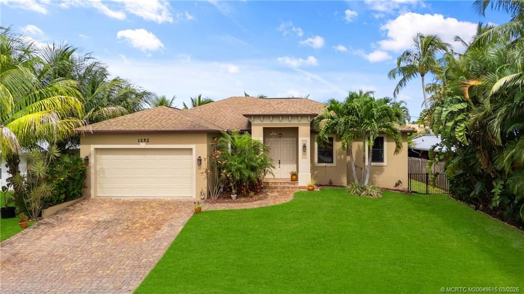 Photo of 1252 SW Seahawk Way, Palm City, FL 34990 (MLS # M20049515)