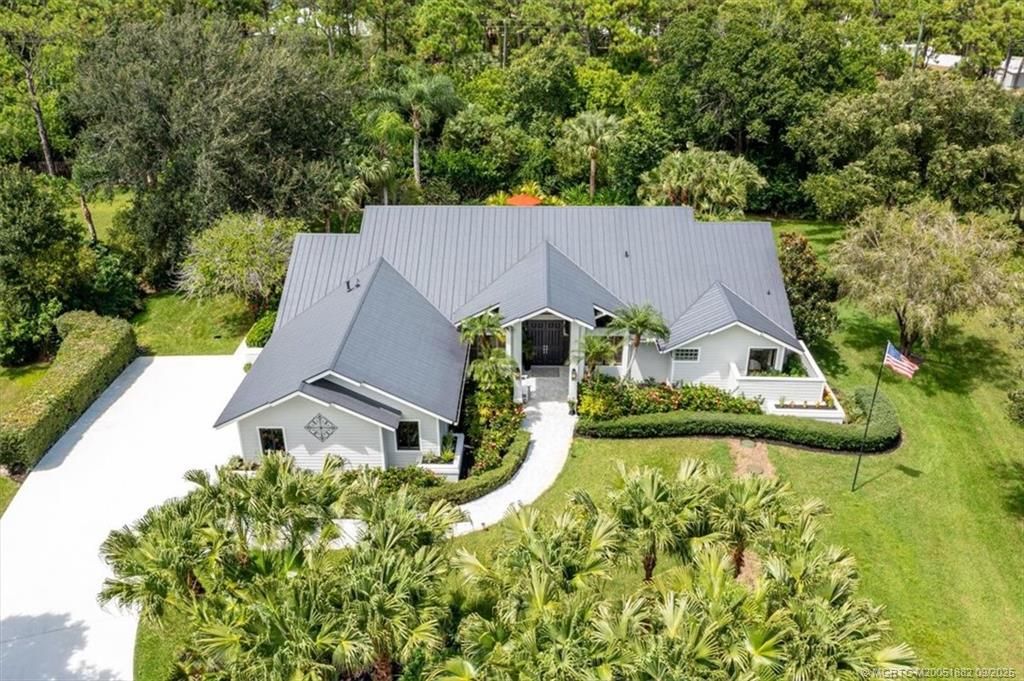 Photo of 2582 SW Racquet Club Drive, Palm City, FL 34990 (MLS # M20051882)