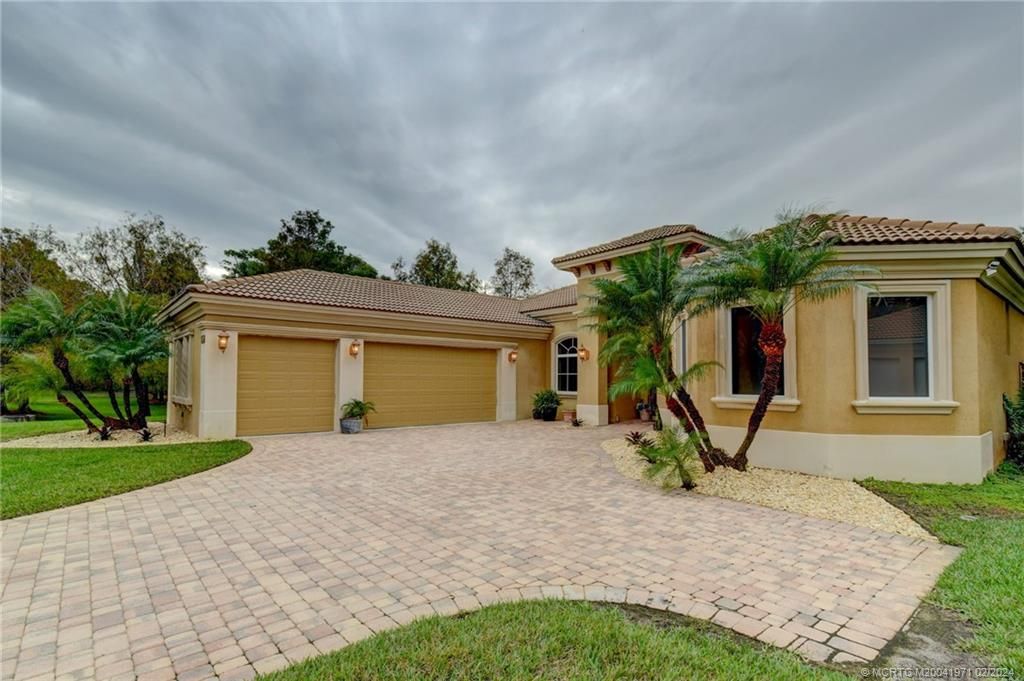 Photo of 8300 SW Cattleya Drive, Stuart, FL 34997 (MLS # M20041971)