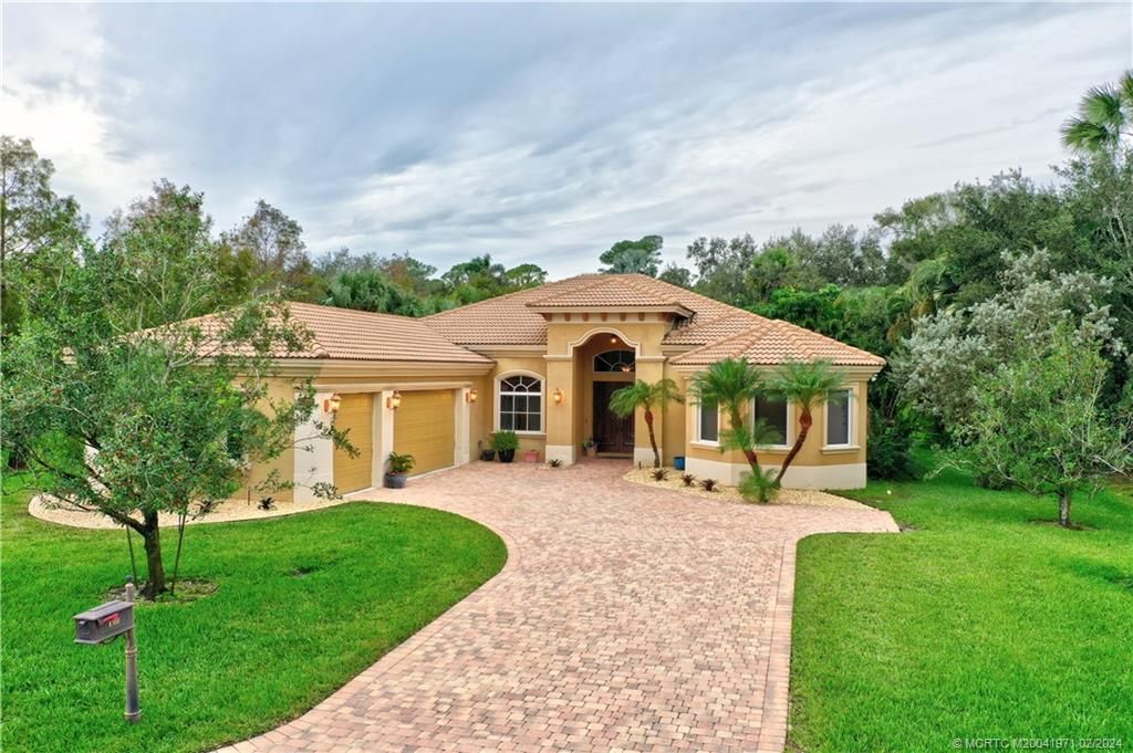 Photo of 8300 SW Cattleya Drive, Stuart, FL 34997 (MLS # M20041971)