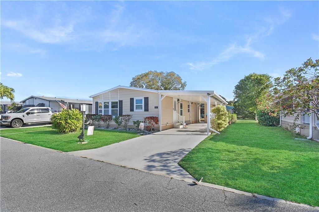 Photo of 551 Barb Ann Lane, Port Saint Lucie, FL 34952 (MLS # M20053928)