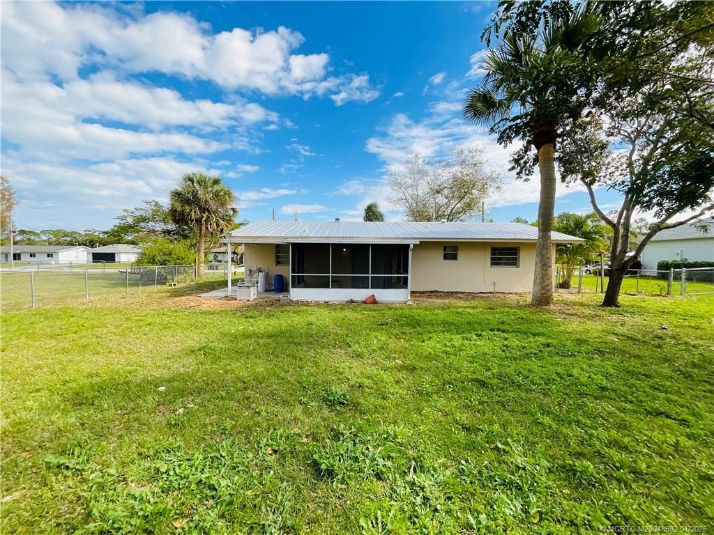 Photo of 5607 Myrtle Drive, Fort Pierce, FL 34982 (MLS # M20048592)