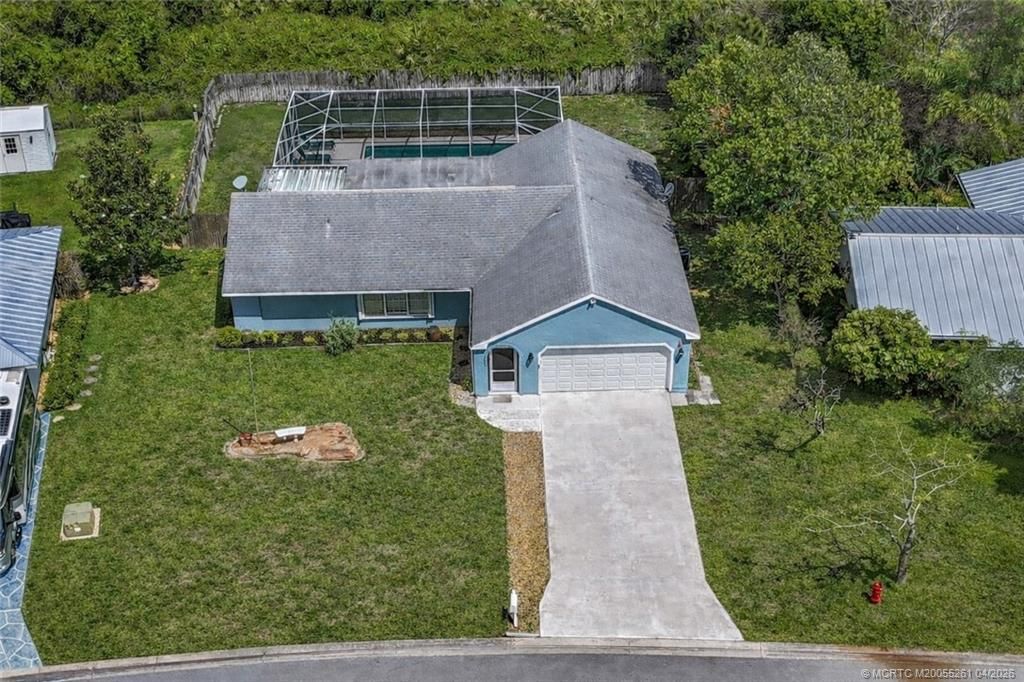 Photo of 1338 SE Buckingham Terrace, Port Saint Lucie, FL 34952 (MLS # M20055261)