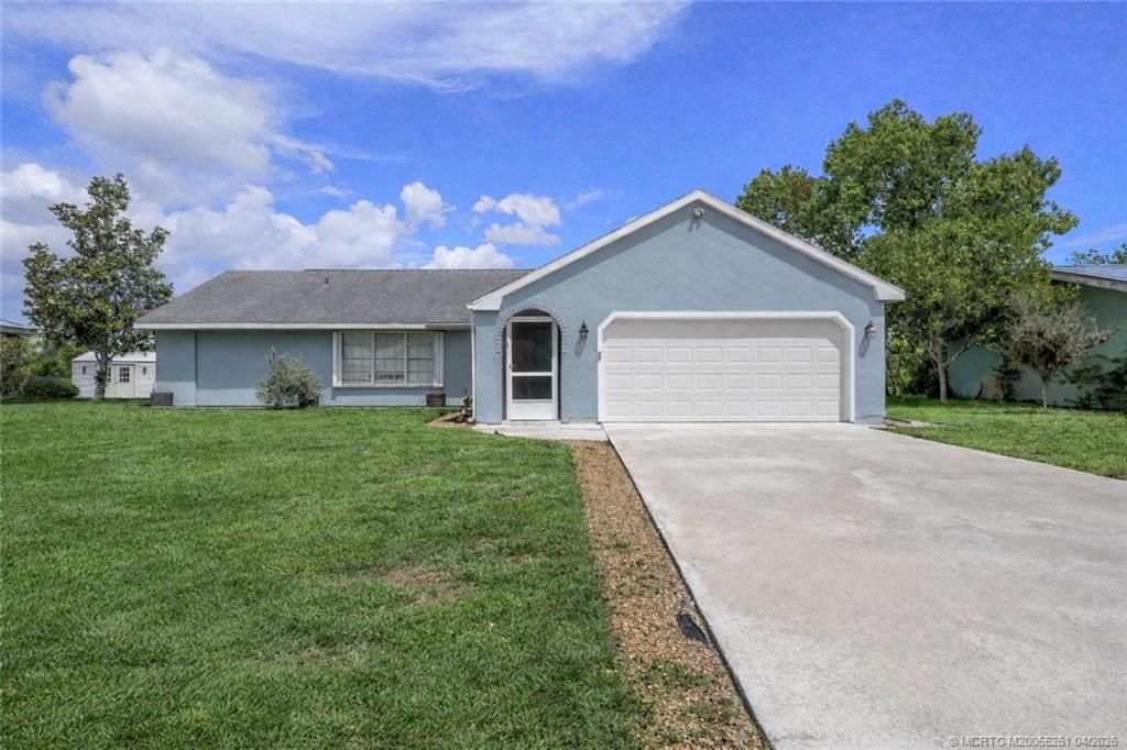 Photo of 1338 SE Buckingham Terrace, Port Saint Lucie, FL 34952 (MLS # M20055261)