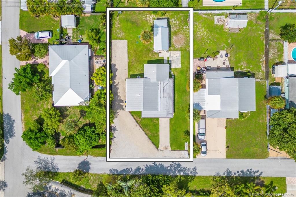 Photo of 1593 NE Orion Street, Jensen Beach, FL 34957 (MLS # M20050617)