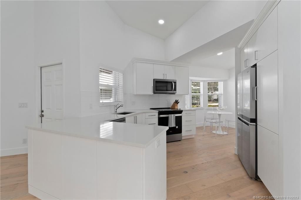 Photo of 2426 SW Foxpoint Trail, Palm City, FL 34990 (MLS # M20041878)