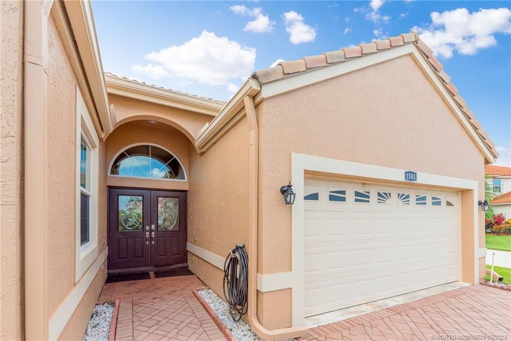 Photo of 1501 SE Holyrood Lane, Port Saint Lucie, FL 34952 (MLS # M20039528)