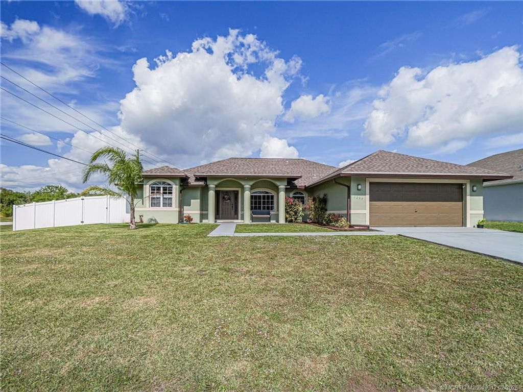 Photo of 1297 SW Ackard Avenue, Port Saint Lucie, FL 34953 (MLS # M20049012)