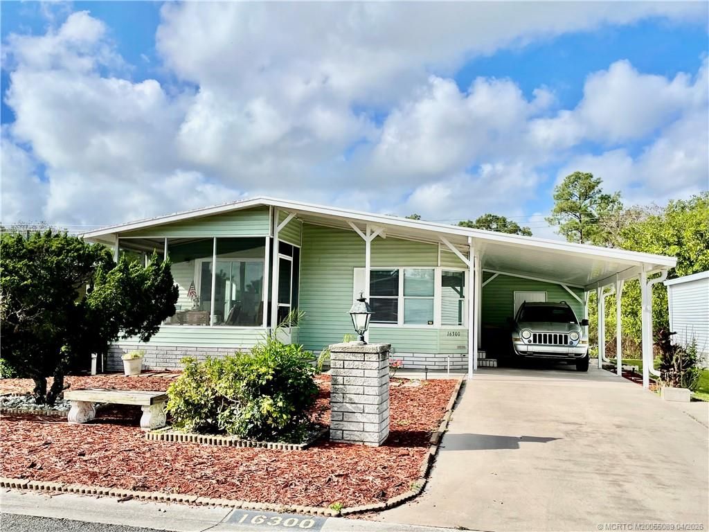 Photo of 16300 SW Indianwood Circle, Indiantown, FL 34956 (MLS # M20055089)