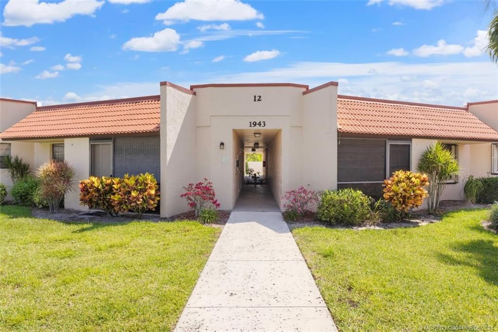 Photo of 1943 NE Collins Circle #12-50, Jensen Beach, FL 34957 (MLS # M20044895)