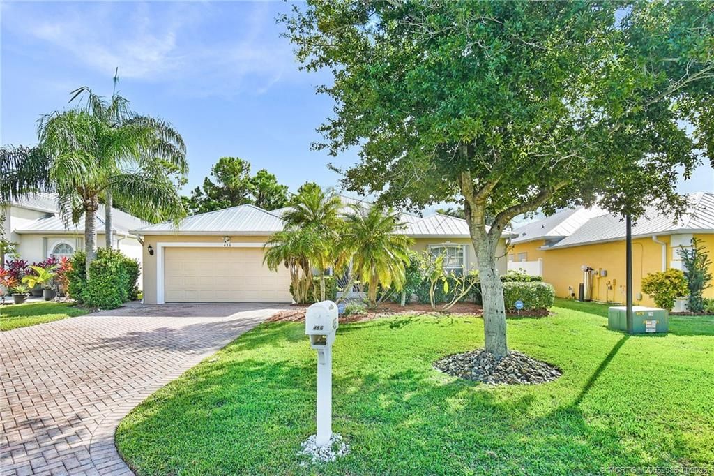 Photo of 486 NW Sunflower Place, Jensen Beach, FL 34957 (MLS # M20052988)