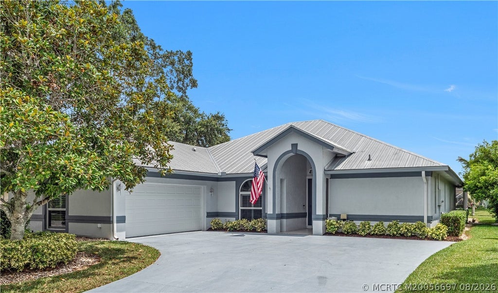 Photo of 1999 SW Oakwater Point, Palm City, FL 34990 (MLS # M20056697)