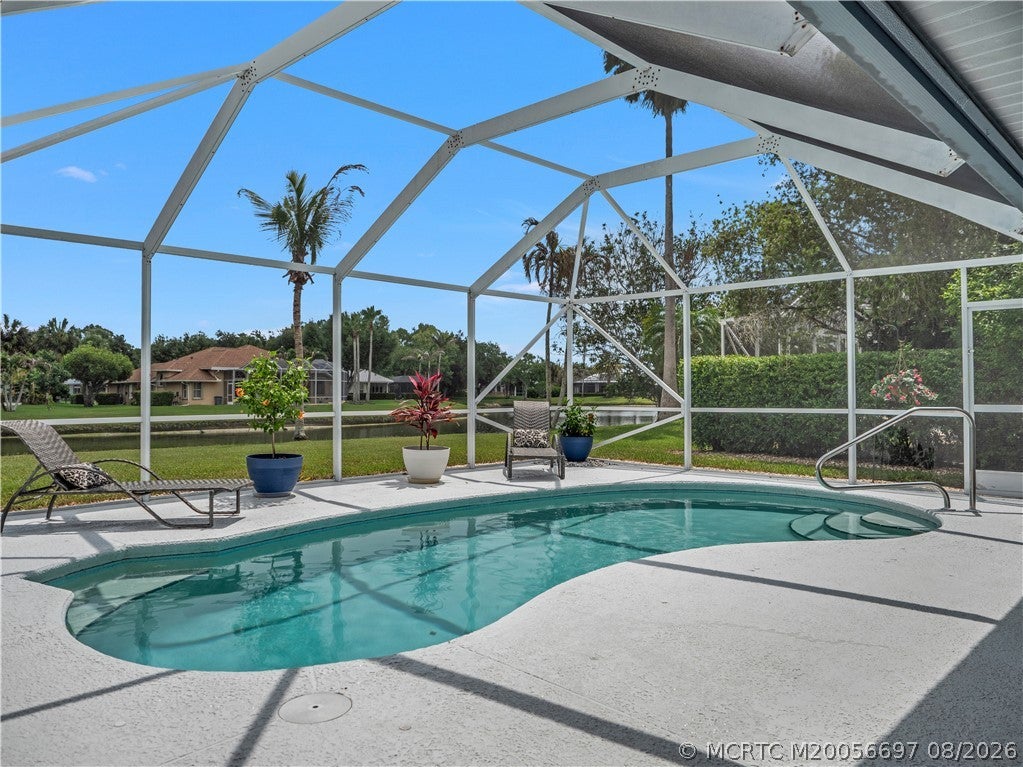 Photo of 1999 SW Oakwater Point, Palm City, FL 34990 (MLS # M20056697)