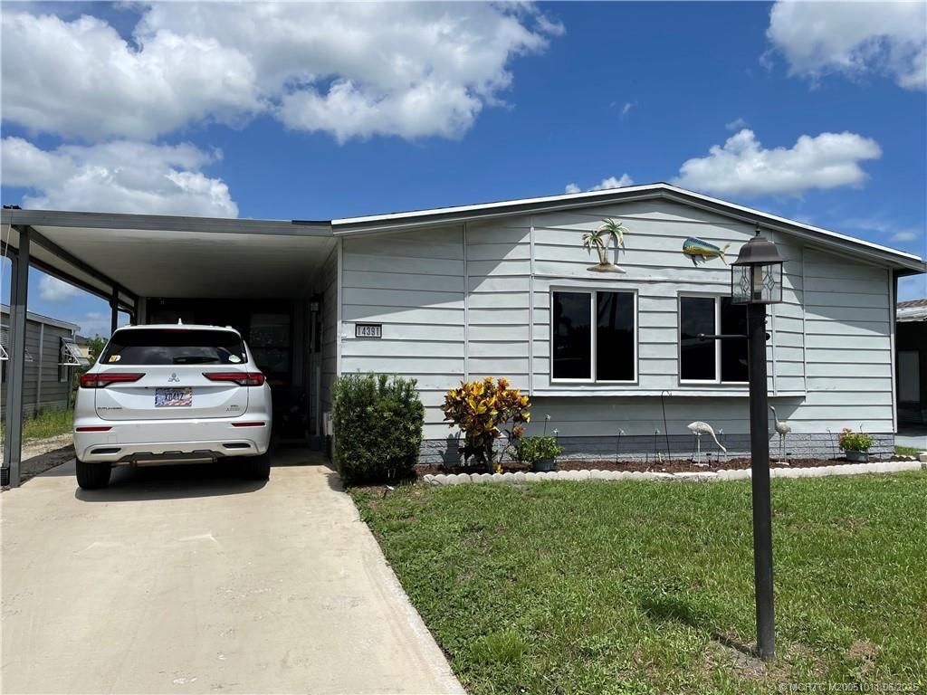 Photo of 14391 SW Divot Drive, Indiantown, FL 34956 (MLS # M20051011)