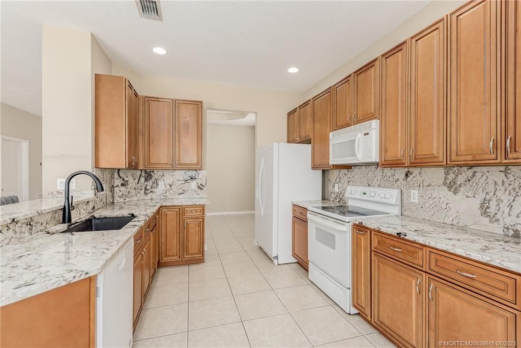 Photo of 2791 NW Windemere Drive, Jensen Beach, FL 34957 (MLS # M20039515)