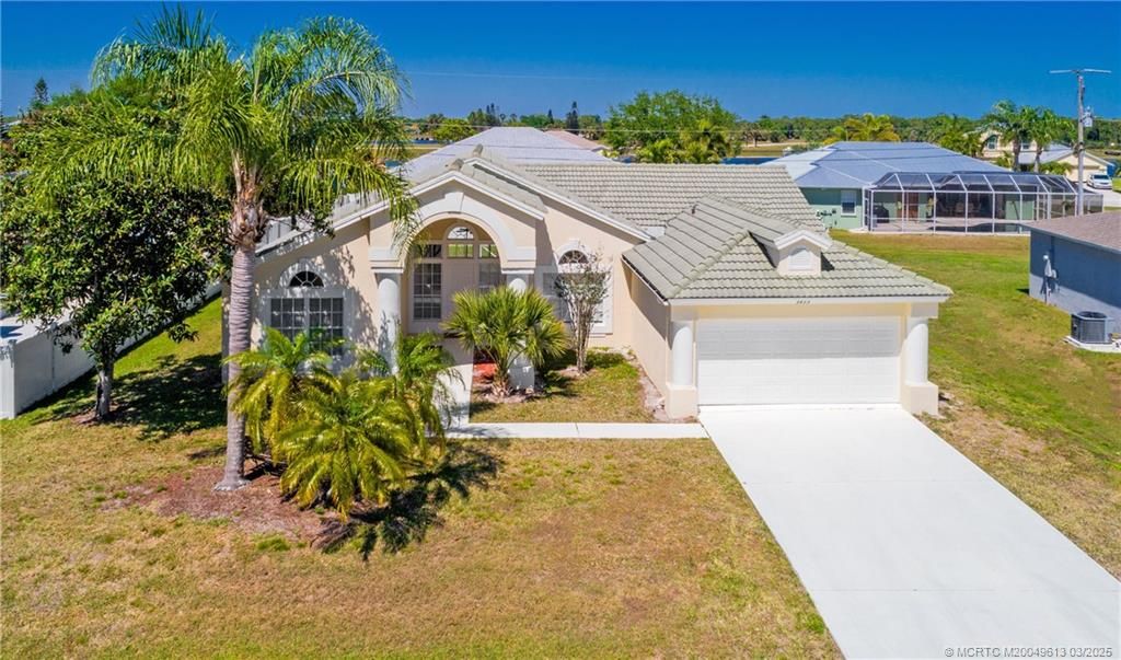 Photo of 3433 SE Hart Circle, Port Saint Lucie, FL 34984 (MLS # M20049613)