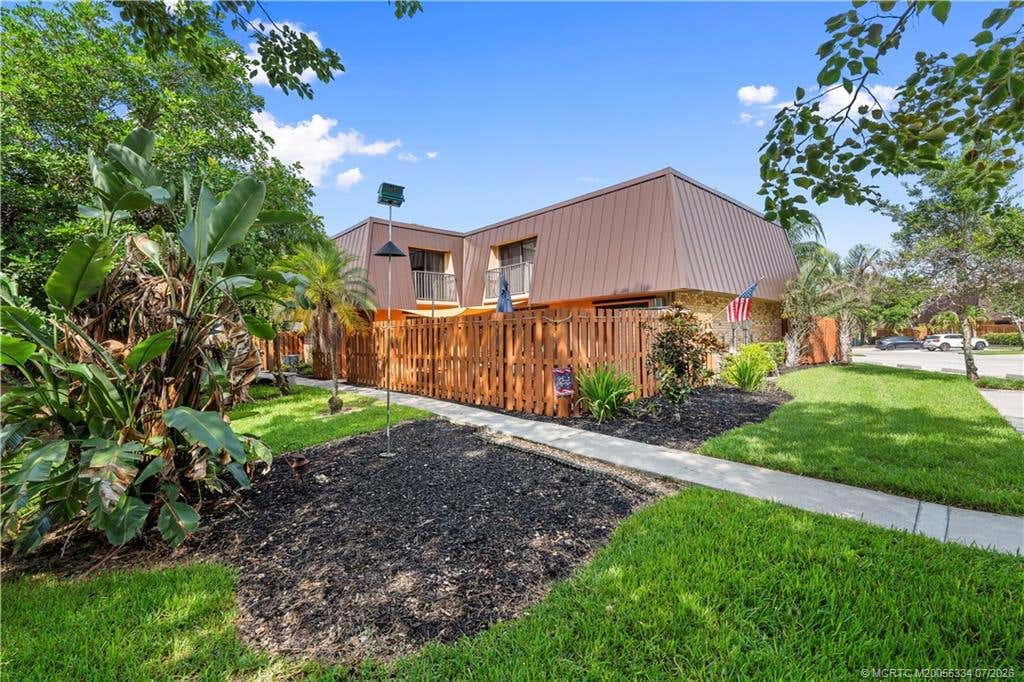 Photo of 6145 SE Windsong Lane, Stuart, FL 34997 (MLS # M20056334)
