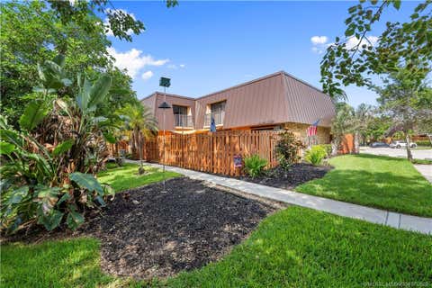Photo of 6145 SE Windsong Lane, Stuart, FL 34997 (MLS # M20056334)
