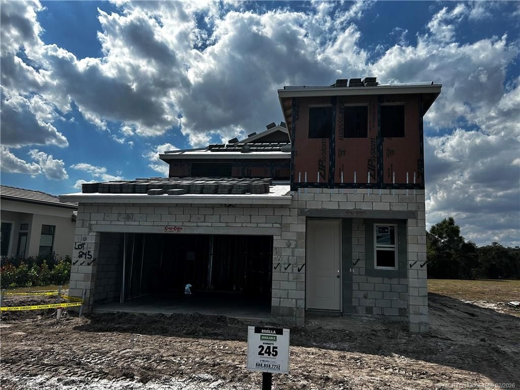 Photo of 299 SE Via Sangro, Port Saint Lucie, FL 34952 (MLS # M20054569)