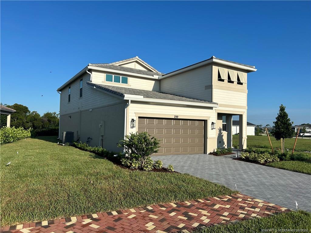 Photo of 299 SE Via Sangro, Port Saint Lucie, FL 34952 (MLS # M20054569)