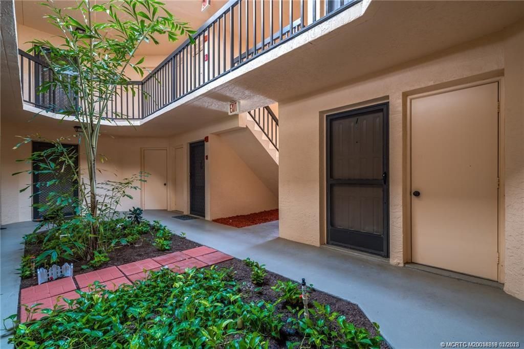 Photo of 2069 NE Collins Circle #7-1, Jensen Beach, FL 34957 (MLS # M20038218)