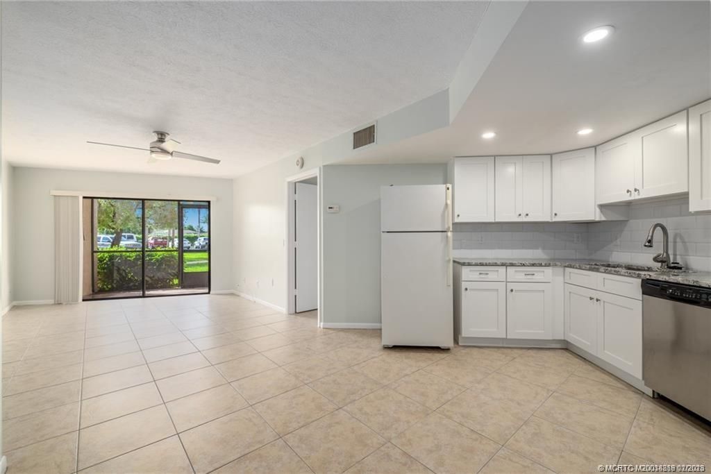 Photo of 2069 NE Collins Circle #7-1, Jensen Beach, FL 34957 (MLS # M20038218)