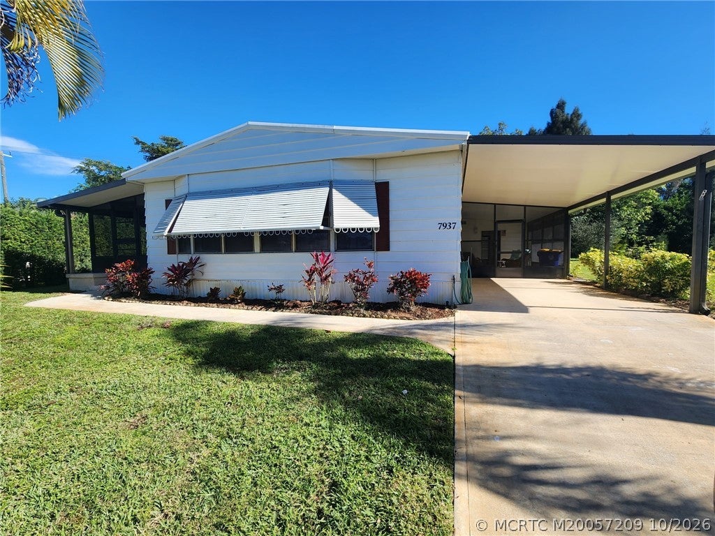 Photo of 7937 SE Continental Drive, Hobe Sound, FL 33455 (MLS # M20057209)