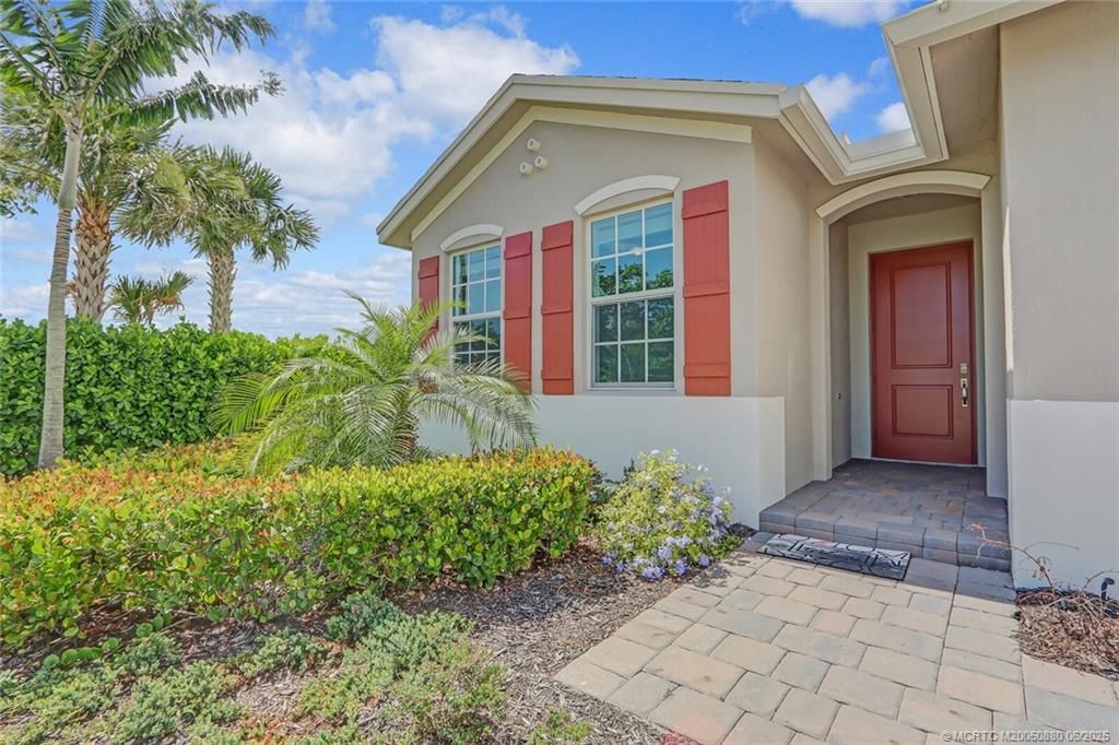 Photo of 1630 NE Skyhigh Terrace, Jensen Beach, FL 34957 (MLS # M20050880)