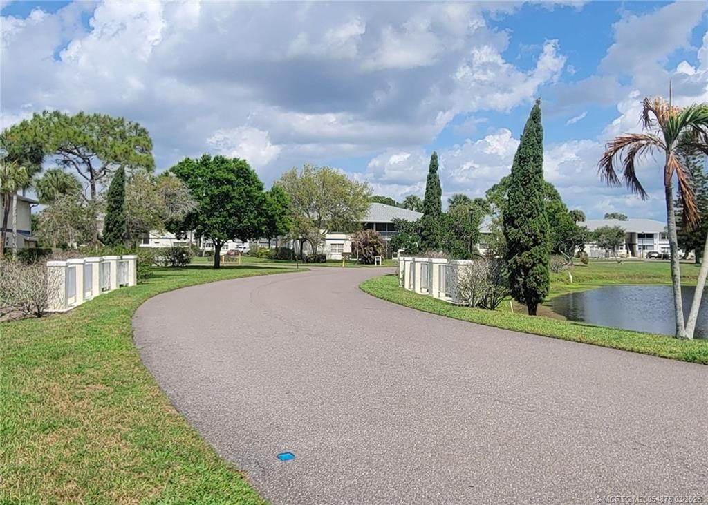 Photo of 1524 SE Royal Green Circle #101, Port Saint Lucie, FL 34952 (MLS # M20054878)