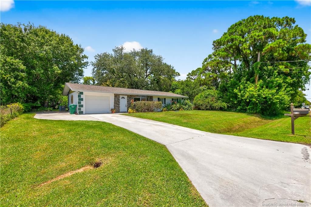 Photo of 6115 Papaya Drive, Fort Pierce, FL 34982 (MLS # M20051626)