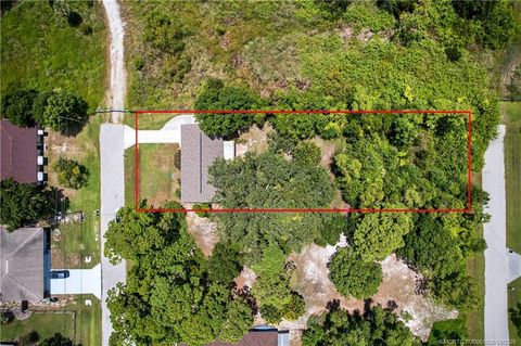 Photo of 6115 Papaya Drive, Fort Pierce, FL 34982 (MLS # M20051626)
