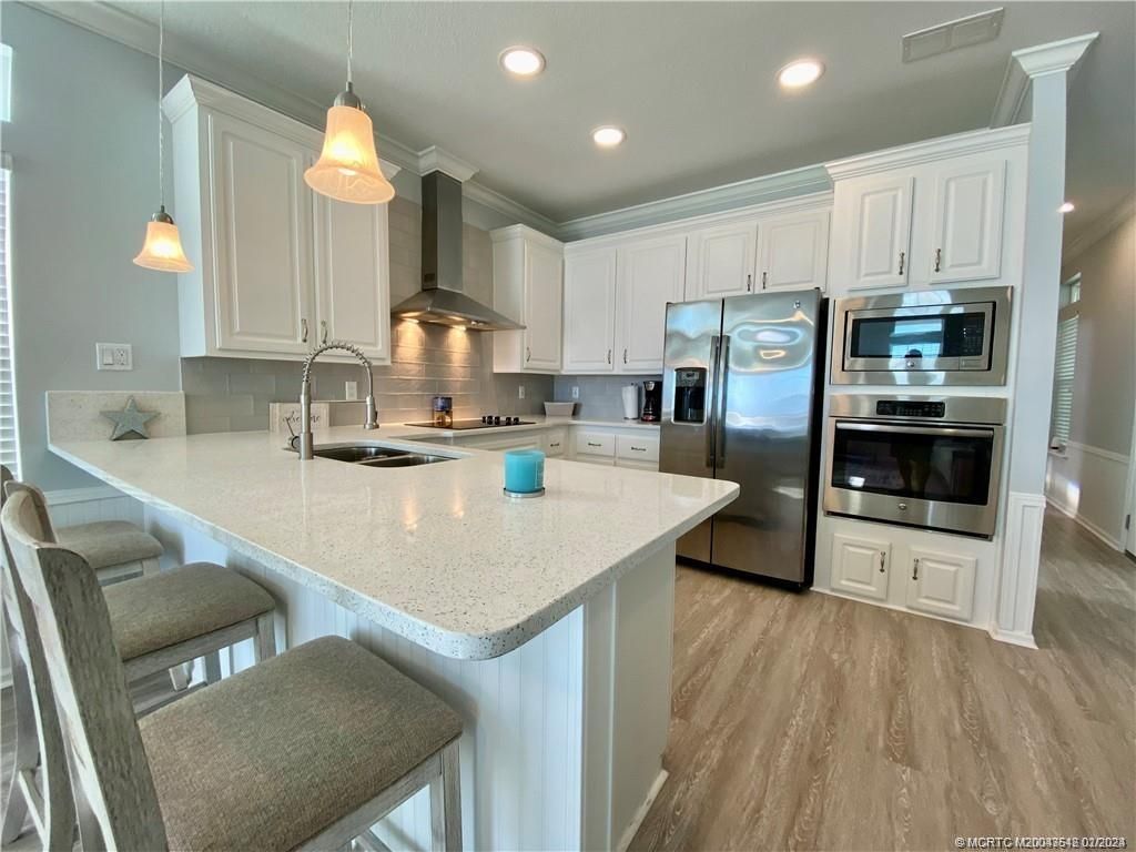 Photo of 18 NE Natical Way, Jensen Beach, FL 34957 (MLS # M20043542)