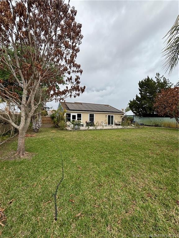 Photo of 1509 SE Belcrest Street, Port Saint Lucie, FL 34952 (MLS # M20055766)