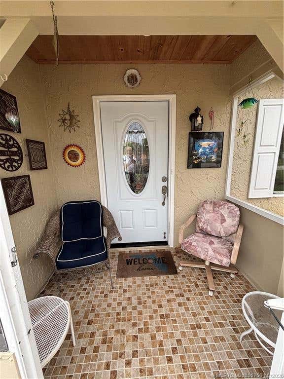 Photo of 1509 SE Belcrest Street, Port Saint Lucie, FL 34952 (MLS # M20055766)