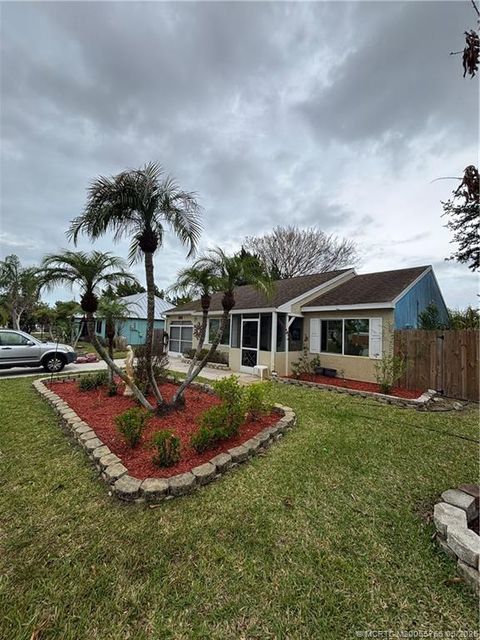 Photo of 1509 SE Belcrest Street, Port Saint Lucie, FL 34952 (MLS # M20055766)