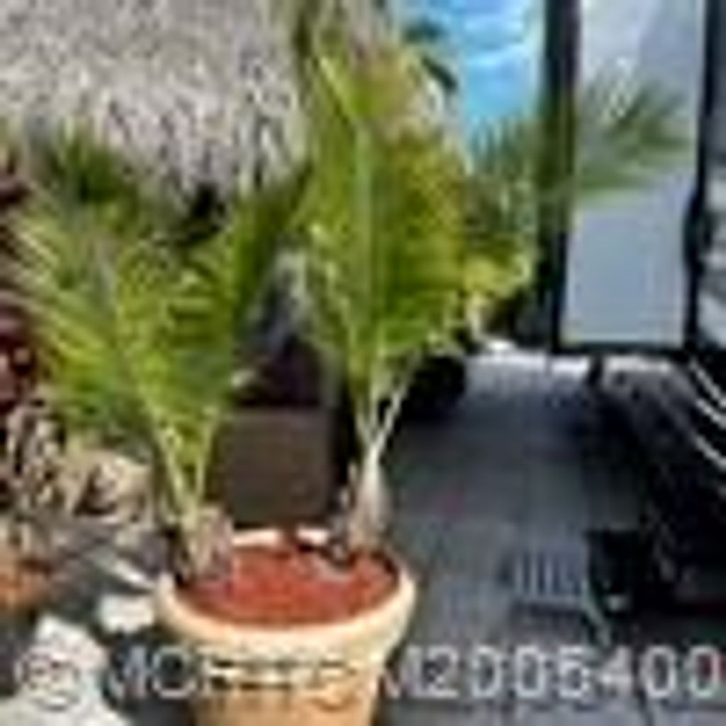 Photo of 8 NW Boundary Drive, Port Saint Lucie, FL 34986 (MLS # M20054002)