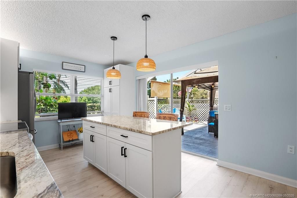 Photo of 3273 SW Sunset Trace Circle, Palm City, FL 34990 (MLS # M20050269)