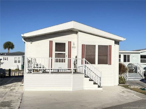 Photo of 1224 Nettles Boulevard, Jensen Beach, FL 34957 (MLS # M20054256)