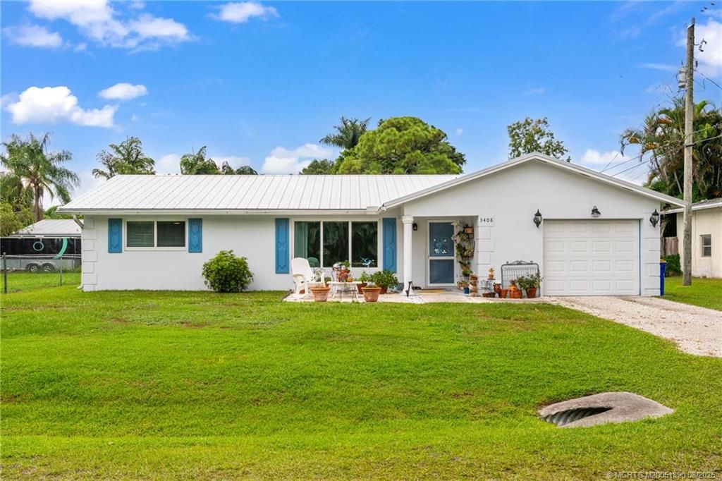 Photo of 3408 SW Reilley Avenue, Palm City, FL 34990 (MLS # M20051890)