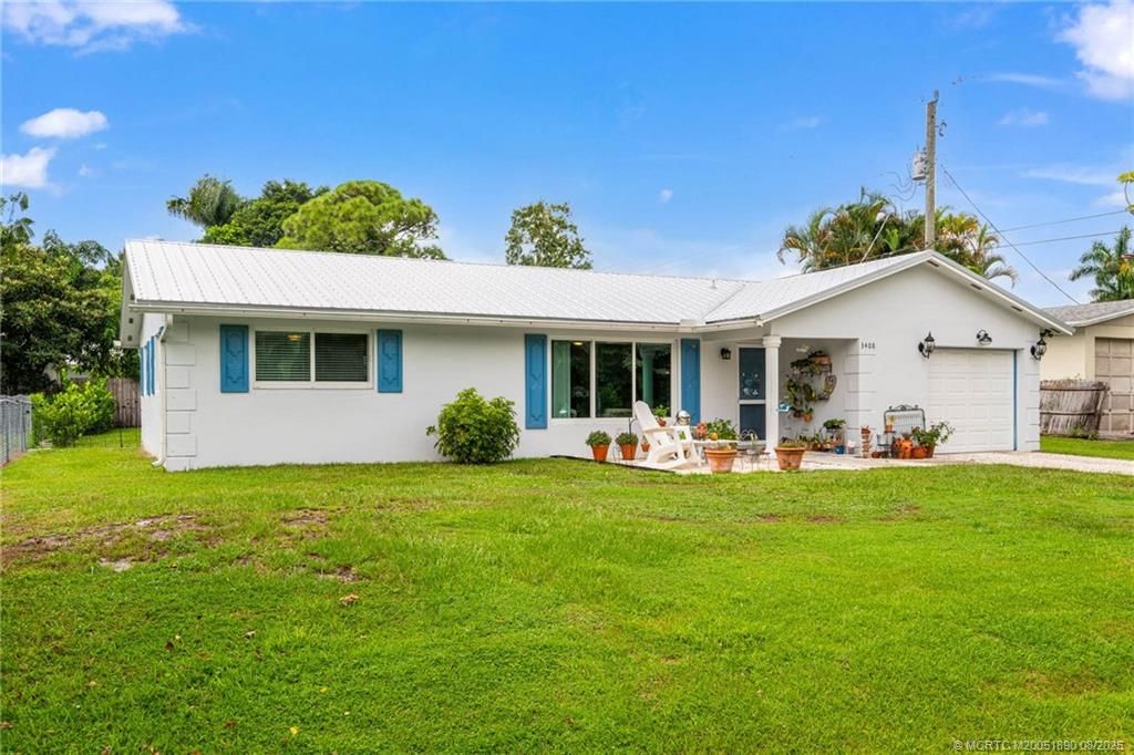 Photo of 3408 SW Reilley Avenue, Palm City, FL 34990 (MLS # M20051890)