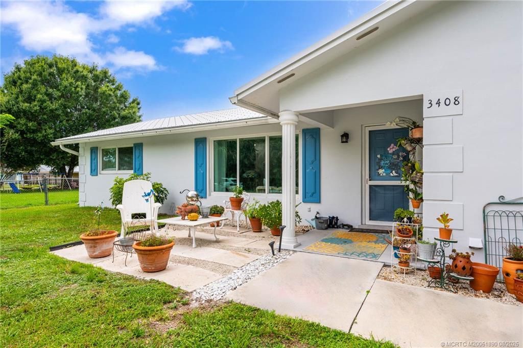 Photo of 3408 SW Reilley Avenue, Palm City, FL 34990 (MLS # M20051890)