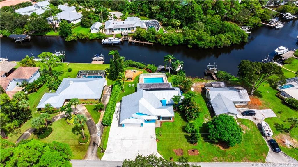 Photo of 1121 SW Pine Tree Lane, Palm City, FL 34990 (MLS # M20046982)