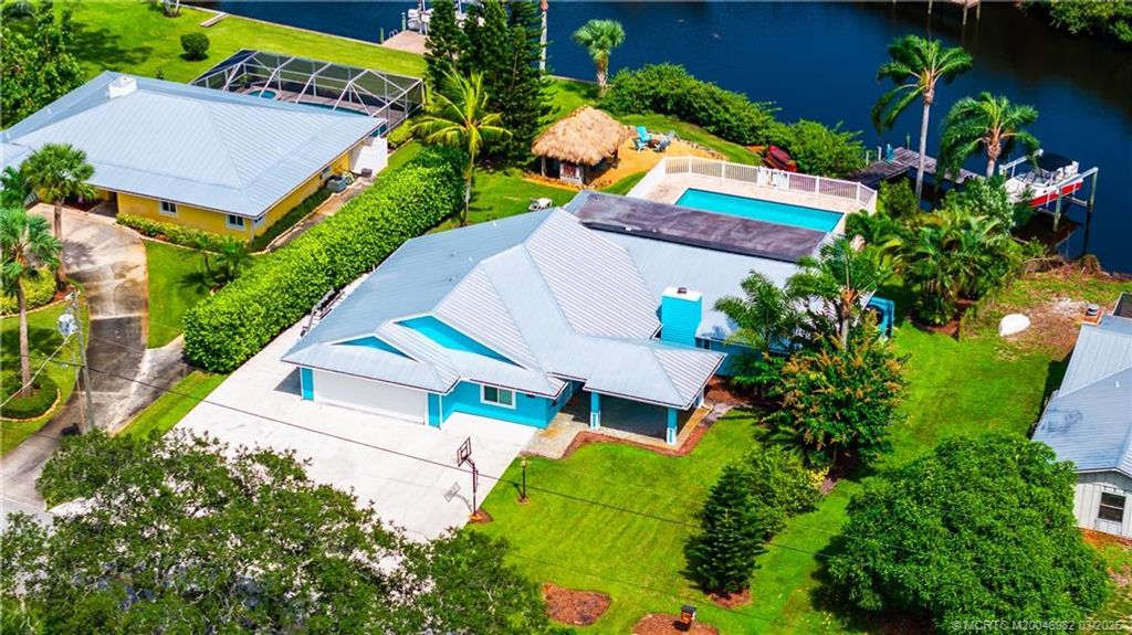 Photo of 1121 SW Pine Tree Lane, Palm City, FL 34990 (MLS # M20046982)