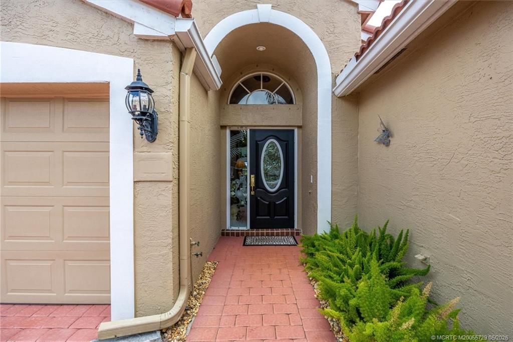 Photo of 6948 SE Twin Oaks Circle, Stuart, FL 34997 (MLS # M20055729)