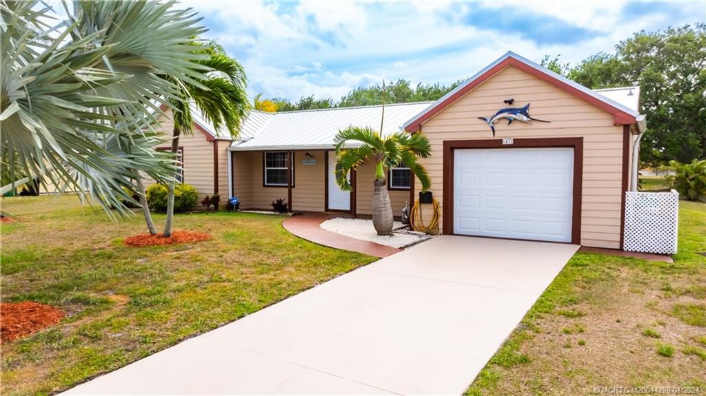 Photo of 1432 SE Marisol Lane, Port Saint Lucie, FL 34952 (MLS # M20044298)