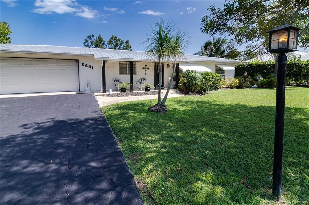 Photo of 2481 NW Everglades Boulevard, Stuart, FL 34994 (MLS # M20041091)