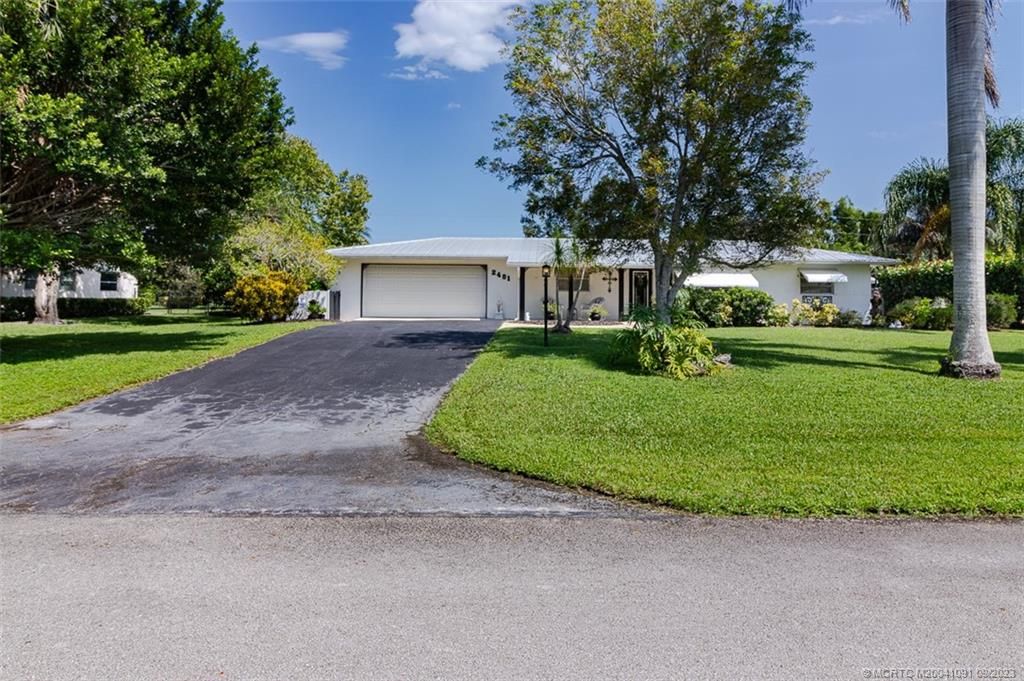 Photo of 2481 NW Everglades Boulevard, Stuart, FL 34994 (MLS # M20041091)