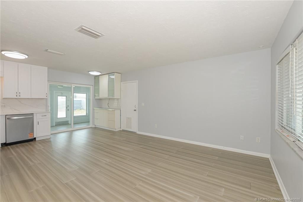 Photo of 712 NE Camino Street, Port Saint Lucie, FL 34952 (MLS # M20050239)